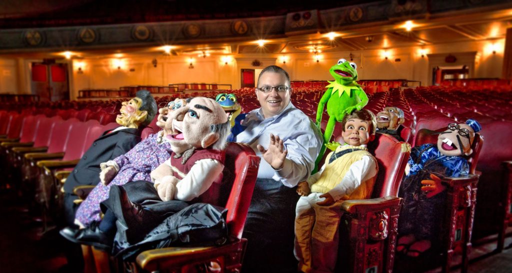 Jimmy and the cast take their seats in the theater
