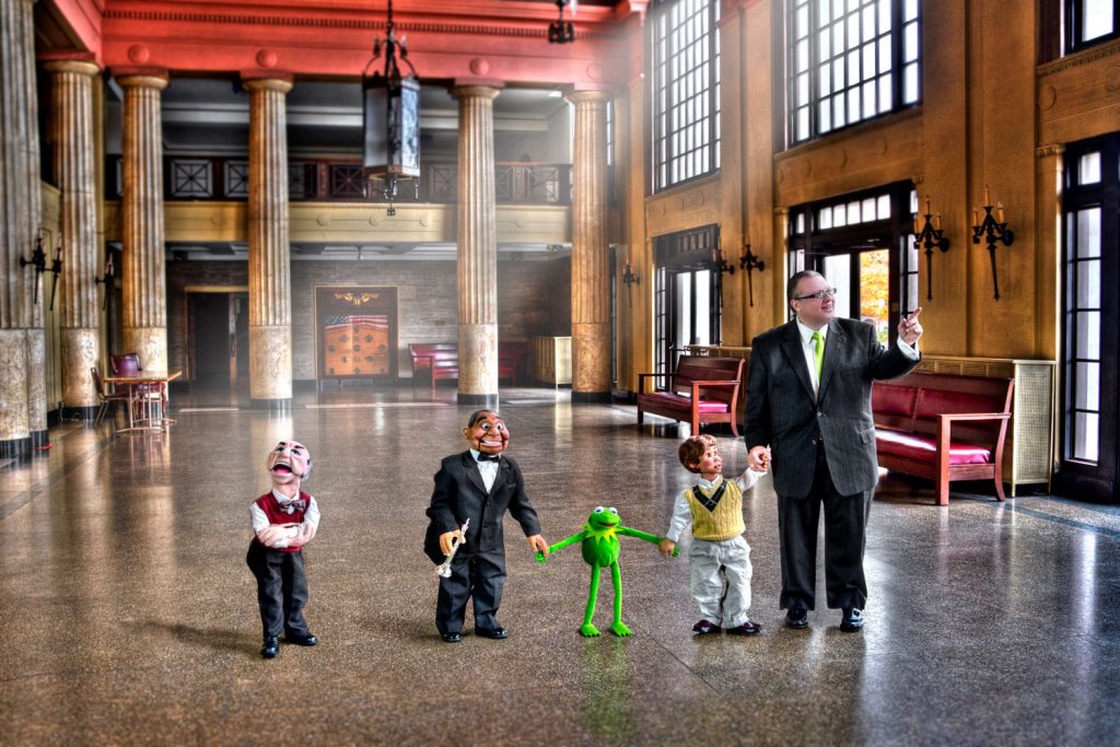 Jimmy and four of his friends in a grand hall
